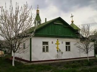 Φωτογραφία για Ουκρανοί εξτρεμιστές εισέβαλαν σε ναό, διαπόμπευσαν τον ιερέα, έγραψαν υβριστικά και απειλητικά συνθήματα