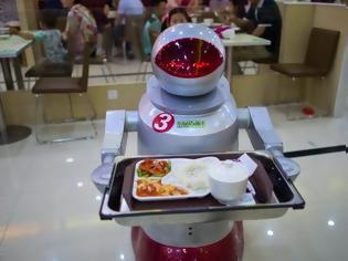 Φωτογραφία για Εστιατόριο χρησιμοποιεί ρομπότ σερβιτόρους και μάγειρες... [video]