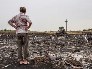 Φωτογραφία για Επίσημο πόρισμα για το μοιραίο MH17 των Μαλαισιανών αερογραμμών: Χτυπήθηκε από ιπτάμενα αντικείμενα πάνω από την Ουκρανία