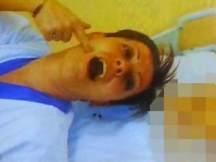 Φωτογραφία για ΑΡΡΩΣΤΟ! Νοσηλεύτρια έβγαζε χαμογελαστές selfies με ΝΕΚΡΟΥΣ...[photos]