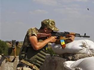 Φωτογραφία για Νεκροί δύο εθελοντές σε συγκρούσεις στο ανατολική Ουκρανία
