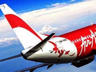 Φωτογραφία για Στην στεριά κομμάτι της ουράς του αεροπλάνου της AirAsia [photo]
