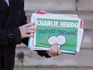 Φωτογραφία για Αναστέλλει την έκδοση του το Charlie Hebdo