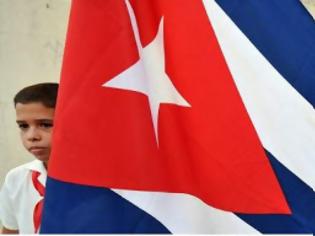 Φωτογραφία για Η σημαία της Κούβας κυματίζει στο αμερικανικό ΥΠΕΞ - Για πρώτη φορά από το 1961