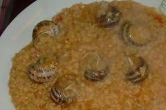 Φτιάξτε παραδοσιακούς Κρητικούς χοχλιούς με πιλάφι