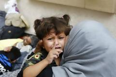 Σοκ: Οι Τούρκοι πωλούν σωσίβια και σαμπρέλες στους πρόσφυγες [photo]