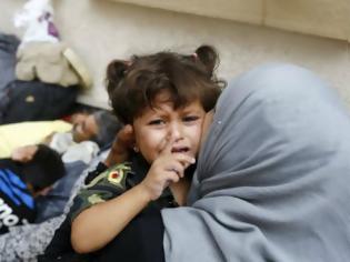 Φωτογραφία για Σοκ: Οι Τούρκοι πωλούν σωσίβια και σαμπρέλες στους πρόσφυγες [photo]