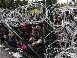 Φωτογραφία για Σύνορα Ουγγαρίας - Σερβίας: Πολυβόλα, στρατός, αστυνομία απέναντι στους πρόσφυγες