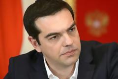 O Τσίπρας στην άσκηση «Παρμενίων»: Με στρατιωτικό δερμάτινο τζάκετ που έγραφε το όνομά του... πιλοτάρει C130 [photos]