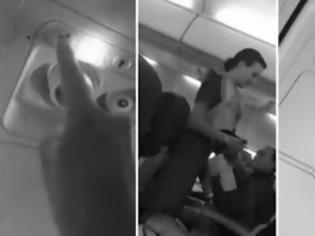 Φωτογραφία για Απίστευτος ο τύπος! Βαριόταν στο αεροπλάνο και... δείτε τι σκέφτηκε να κάνει! [video]