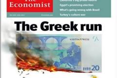 Ο Έλληνας λαμπαδηδρόμος καίει το ευρώ στο εξώφυλλο του Economist
