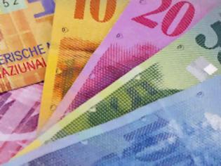 Φωτογραφία για Ελβετία: Εθνικός μισθός 2.500 ελβετικά φράγκα για κάθε πολίτη