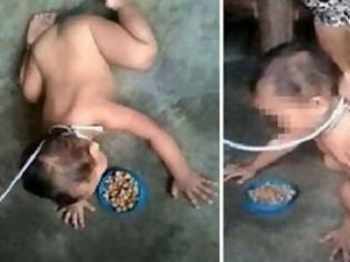 Φωτογραφία για ΚΤΗΝΩΔΙΑ: Μάνα - ΤΕΡΑΣ έδεσε με σκοινί το παιδί της και το τάιζε σκυλοτροφή