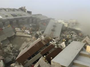Φωτογραφία για Ταϊβάν: Πάνω από 100 πτώματα ανέσυραν οι διασώστες από το κτήριο που κατέρρευσε