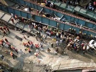 Φωτογραφία για Έφτασαν τους 14 οι νεκροί από την κατάρρευση γέφυρας στην Ινδία