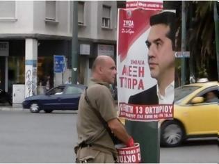 Φωτογραφία για Γέμισε η Αθήνα αφίσες του Τσίπρα - Η αντίδραση του Καραμέρου [photos]